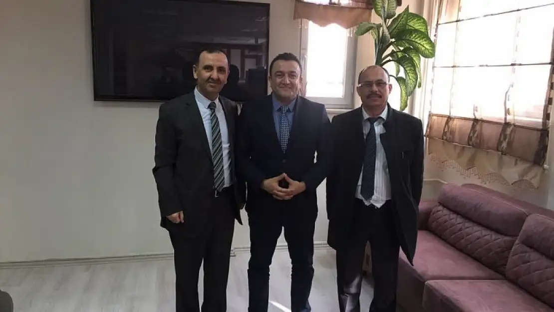 VERGİ DAİRESİNDEN ÖĞRETMENEVİNE PLAKET