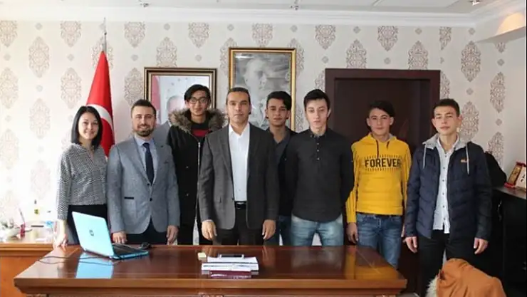 BÜKREŞ YOLCULARINDAN KAYMAKAM ÇİÇEK'E ZİYARET